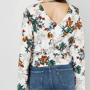 Gimmicks by BKE Floral Wrap Blouse H5 thumbnail 2