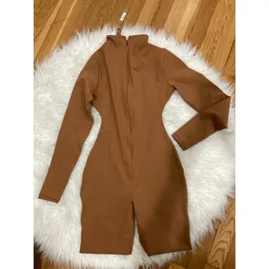 SKIMS Size Small ALL-IN-ONE LONG SLEEVE MID THIGH ONESIE CARAMEL NWT Jumpsuit thumbnail 6
