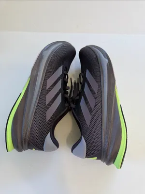 adidas women’s Black Athletic Shoes with White Stripes and Neon Green Accent thumbnail 7