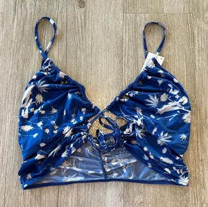 Womens NWT Urban Outfitters Out From Under Blue Criss Cross Cropped Top - L thumbnail 1