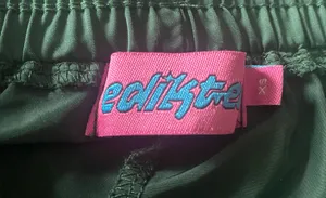 PACSUN-EDIKETED-NIKKI NYLON SHORTS-SIZE XS Lightweight green athletic shorts with contrast pink side stripes. Elastic waistband for a comfortable, secure fit. Breathable fabric designed for everyday wear and active days. Easy to style with tees or tanks Excellent condition thumbnail 7