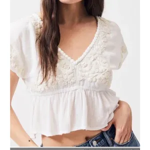 New. Anthropologie RAGA Sorrento Peplum Crop Top in White thumbnail 3