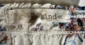 REWIND-CREAM COLOR FLORAL SMOCKED TOP-WOMENS SIZE SMALL Gorgeous top, fro t and back smocking, women’s size small, excellent condition Measurements: Bust: armpit to armpit 14-18 inches Length: shoulder seam to bottom 17 inches thumbnail 8