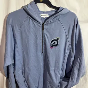 Peloton hoodie (t-shirt like material) blue with hood and front zip size Medium thumbnail 2