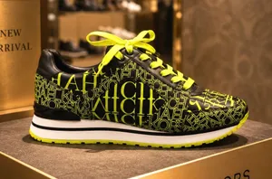 Michael Kors Neon Yellow and Black Trainers - size 9M thumbnail 1