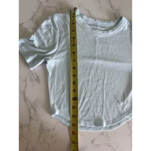 Lululemon Hold Tight Cropped Short Sleeve Ribbed TShirt ~4 Light Blue Curved Hem thumbnail 7