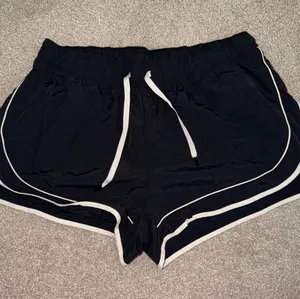 Old Navy Black Athletic Shorts with White Trim thumbnail 1