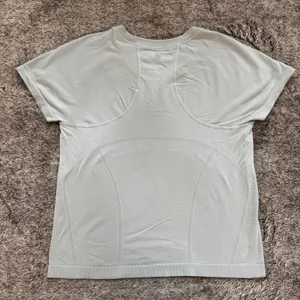 Athleta Momentum Seamless Cropped Tee Women's Large Light Blue/Teal thumbnail 5
