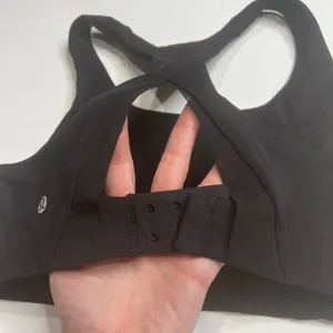 Lululemon size 8 sports bra. Hook and eye in the back up for it thumbnail 5