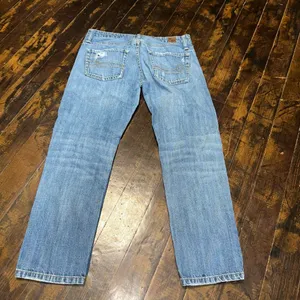 American Eagle size 2 distressed straight light wash jeans thumbnail 2