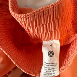 Lululemon size 4 Orange button-up pants Never worn! Brand new! #lululemon #new #buttonup #elastic thumbnail 3