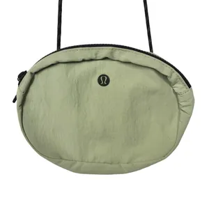 Lululemon‎ Light Mint Green Circle Oval Crossbody Bag thumbnail 2