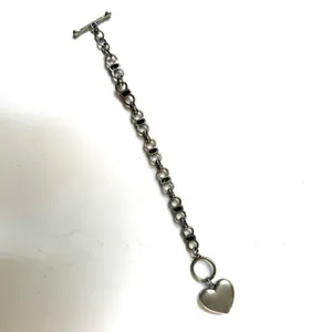 Silver tone bracelet with rhinestone heart charm thumbnail 5