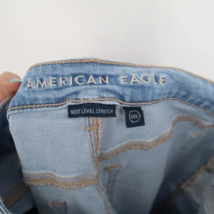 American Eagle Outfitters Jeans Womens 8 Blue Denim Next Level Stretch Raw Hem thumbnail 3