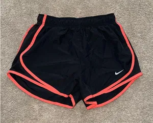 Nike Dri-Fit Women’s Shorts Small Black and Salmon thumbnail 1