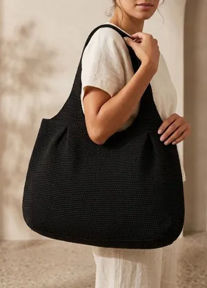 The Sak black crochet shoulder bag woven waffle knit fun interior outer zipper thumbnail 1