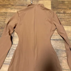 SKIMS All in One Long-Sleeve Mid Thigh Jumpsuit Onesie in Caramel new with tags thumbnail 11