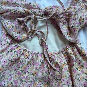 light pink floral top with tie back thumbnail 4