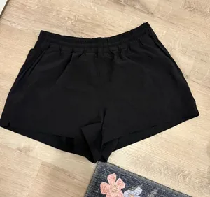 Athleta NWOT Black Shorts Size Medium thumbnail 1