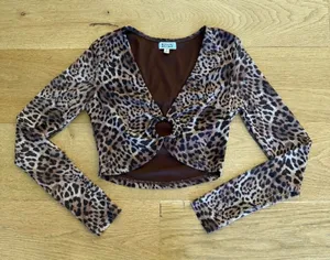 Beginning Boutique Key Hole Leopard Print Long Sleeve Crop Top in Brown thumbnail 1