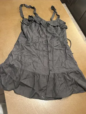 Sleeveless Black Ruffle Button thumbnail 1