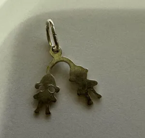 Silver Tone boy and girl Pendant thumbnail 2