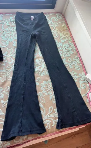Urban Outfitters Black Criss Cross Waist Flare Pants thumbnail 1