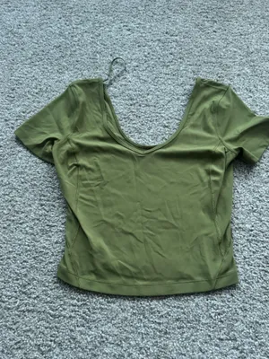 Lululemon Align Tee is featured in the color bronze green and is designed with buttery-soft Nulu fabric thumbnail 2