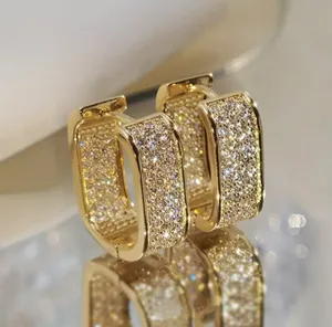 Gold glitter silver hoop earrings thumbnail 1