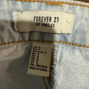 Forever 21 Denim Mini Skirt Frayed Hem Asymmetrical‎ Wrap Light Wash S thumbnail 3