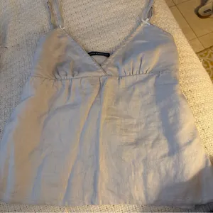 Brandy Melville Light Gray/light blue baby doll Top thumbnail 1