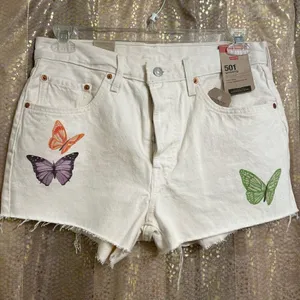 Levi’s Women's 501 Ivory Give Me Butterflies‎ Hi-Rise Denim Shorts, 30 NWT thumbnail 1