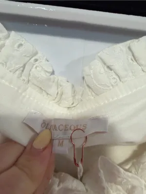 Women's NWT boutique Olivacheous Ivory Eyelet Ruffle Blouse‎ thumbnail 3