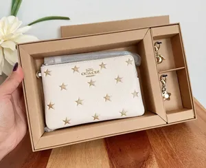 NWT Coach Boxed Corner Zip Wristlet‎ With Star Print And Charms thumbnail 1