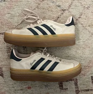 Light pink and navy Adidas gazelles  thumbnail 1