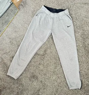 Women’s Nike Dri-Fit grey sweatpants Smll thumbnail 1