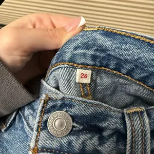 Levi's Light Blue Denim Jeans with Brown Leather Patch thumbnail 6