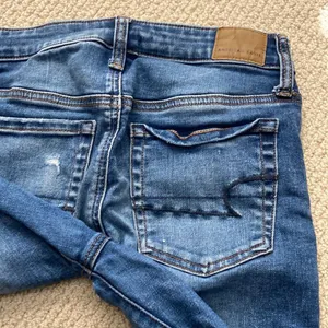 American Eagle Hi-Rise Jegging Jeans Size 2 Short Medium Wash Slim Fit VEUC thumbnail 13
