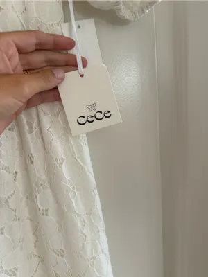 CeCe White Lace Tiered Mini Dress with Black Bow Details thumbnail 3