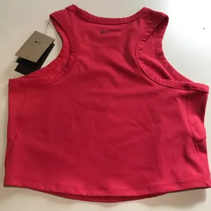 Nike Women's One Dri-FIT Cropped Tank Top in Aster Pink size XL thumbnail 2