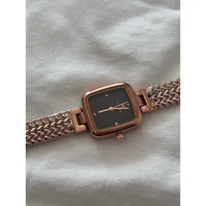 Rose gold watch with black accents thumbnail 6