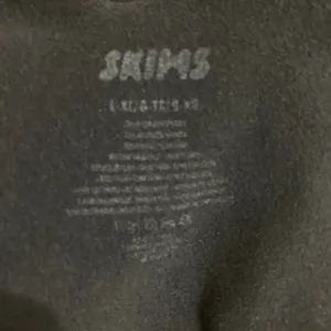 SKIMS Sculpting Thong Bodysuit thumbnail 3