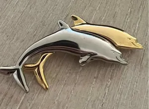 LCI Liz Claiborne Gold And Silver Tone Double Dolphin Figural Brooch thumbnail 1