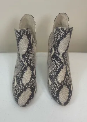 Steve Madden Snake-Print Ankle Boots in Black & Cream thumbnail 1
