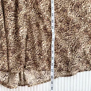 Faithfull the Brand Maggie Midi Dress in the Charlie Leopard Print thumbnail 9