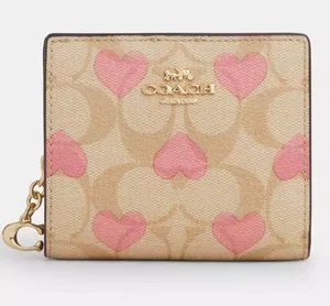 Coach Snap Wallet In Signature Canvas With Heart Print thumbnail 1