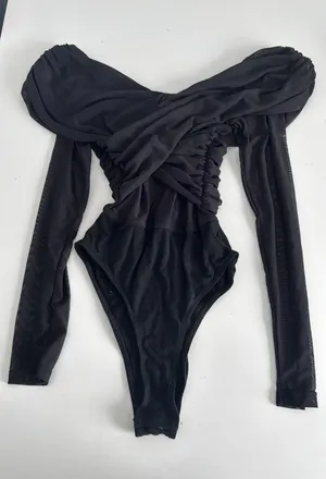 Black mesh bodysuit with long sleeves and an off-the-shoulder neckline size XS thumbnail 1