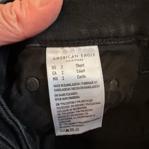 American Eagle Outfitters Distressed Black Hi-Rise Jeggings size 2 Short thumbnail 12