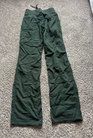 Forest green Lululemon studio dance pants full length thumbnail 1