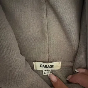 tan garage hoodie thumbnail 2